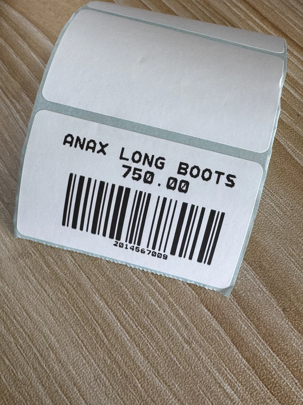 A Deelos product barcode label printed on a 50 by 30 millimetre sticker